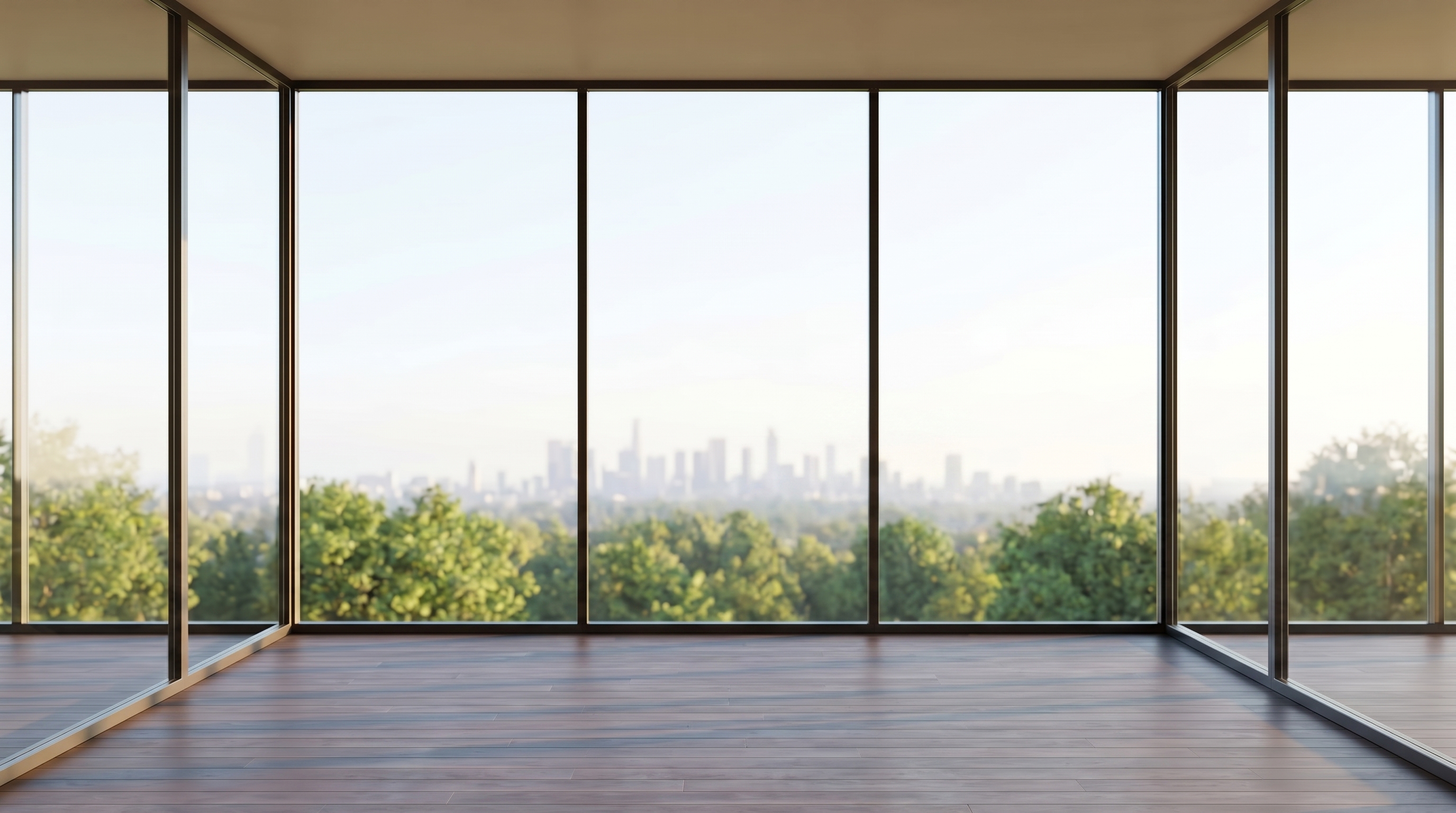 An empty high-rise corner room with dark-framed floor-to-ceiling glass and a dark timber floor, an alternate framing over green treetops and a hazy distant city skyline.